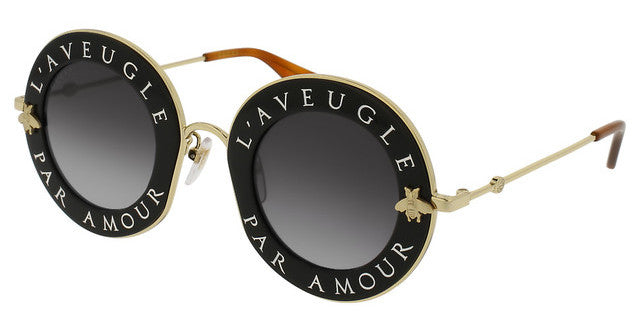 Gucci GG0113S Blind For Love Gafas de sol redondas negras
