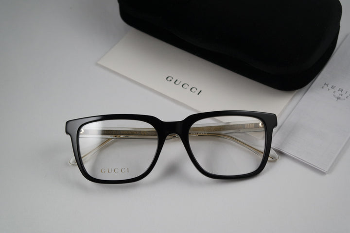 Monturas de anteojos rectangulares atrevidas Gucci GG0560O en negro