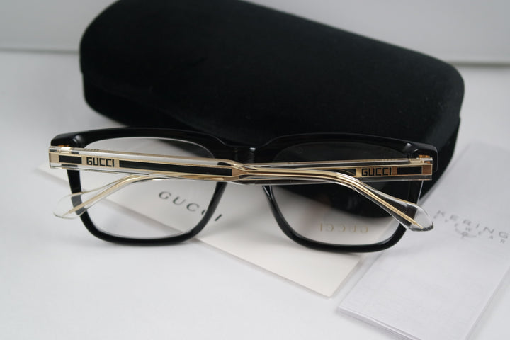 Monturas de anteojos rectangulares atrevidas Gucci GG0560O en negro