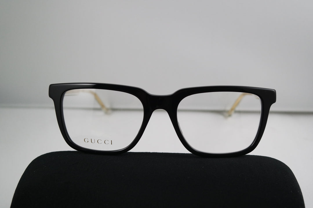Monturas de anteojos rectangulares atrevidas Gucci GG0560O en negro