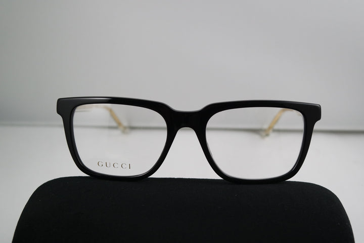 Monturas de anteojos rectangulares atrevidas Gucci GG0560O en negro