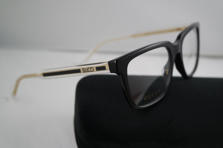 Monturas de anteojos rectangulares atrevidas Gucci GG0560O en negro