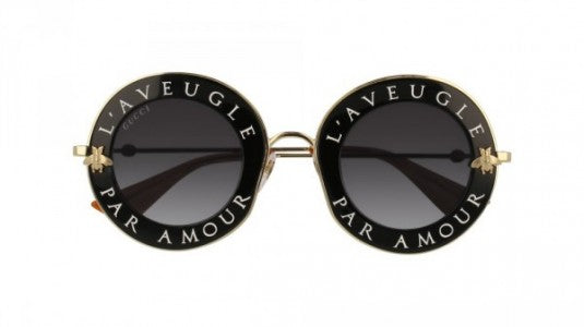 Gucci GG0113S Blind For Love Gafas de sol redondas negras