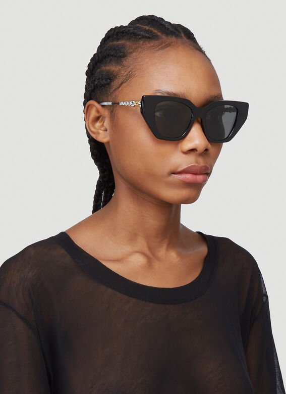 Gucci GG0641S Gafas de sol negras con forma de ojo de gato y cristales 