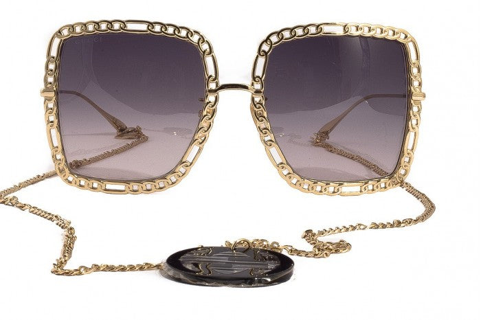 Gafas de sol cuadradas extragrandes con collar de cadena Gucci GG1033S 