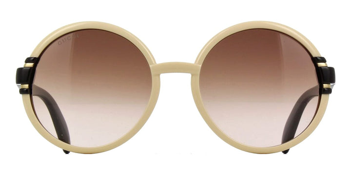 Gafas de sol redondas Gucci GG1067S en marfil 