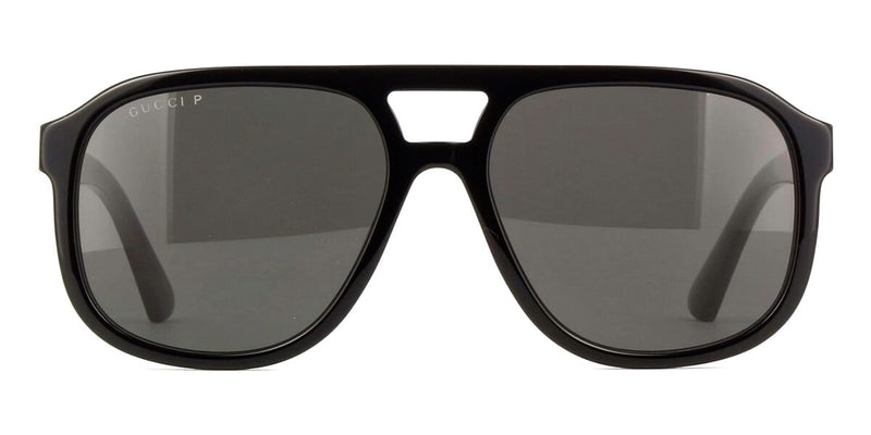 Gucci black aviator sunglasses, front view, dark polarized lenses and gold logo