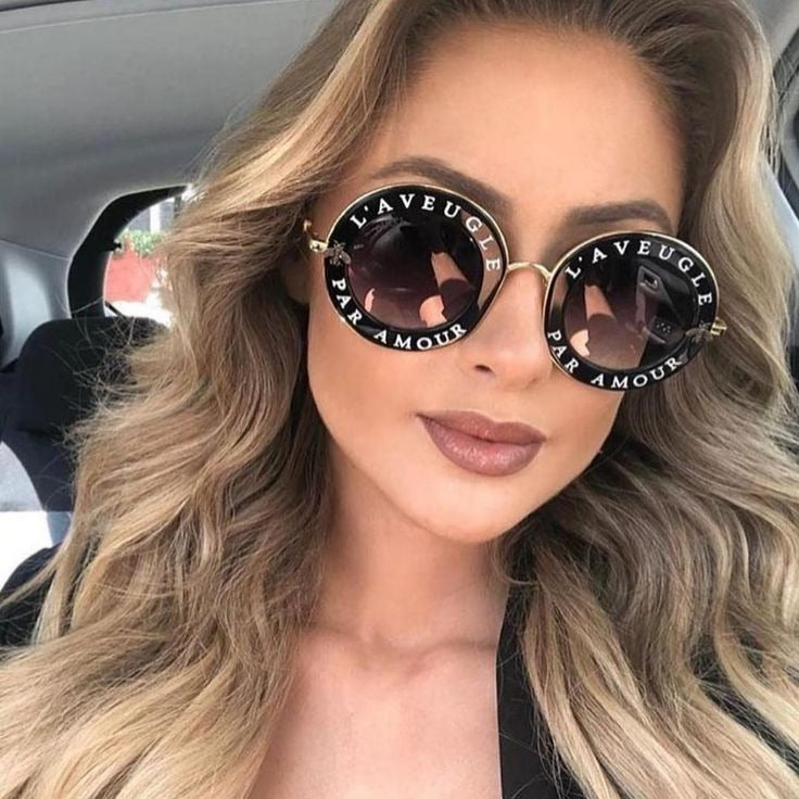 Gucci GG0113S Blind For Love Gafas de sol redondas negras